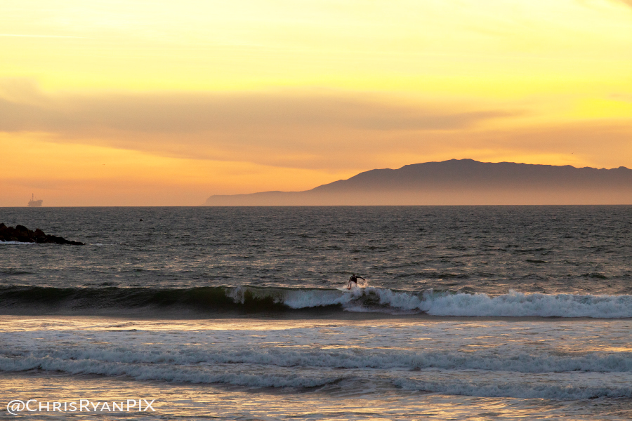 Surfing in front of Anacapa Island of Channel Islands in Ventura