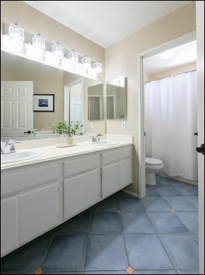 Real Estate Photo of Beautiful Bathroom Tile Floors and Bright