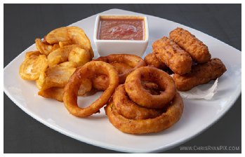 food photography of lunch special featuring onion rings and tots
