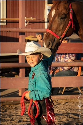 Equine Photograph of Young Wrangler with Horse and Rope (ChrisRyanPIX)
