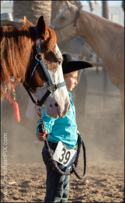Equine Photograph of Young Cowgirl with Horse at Rodeo (ChrisRyanPIX)