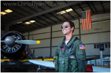 Event Photo of pilot in front of airplane in hanger (ChrisRyanPIX)