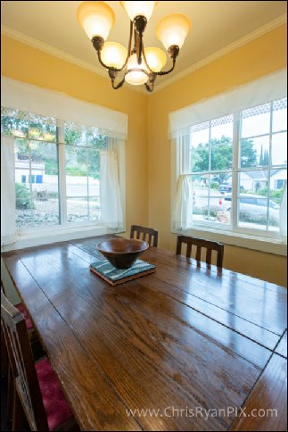 Interior Real Estate Photo of Dining Room Table with Sunlight