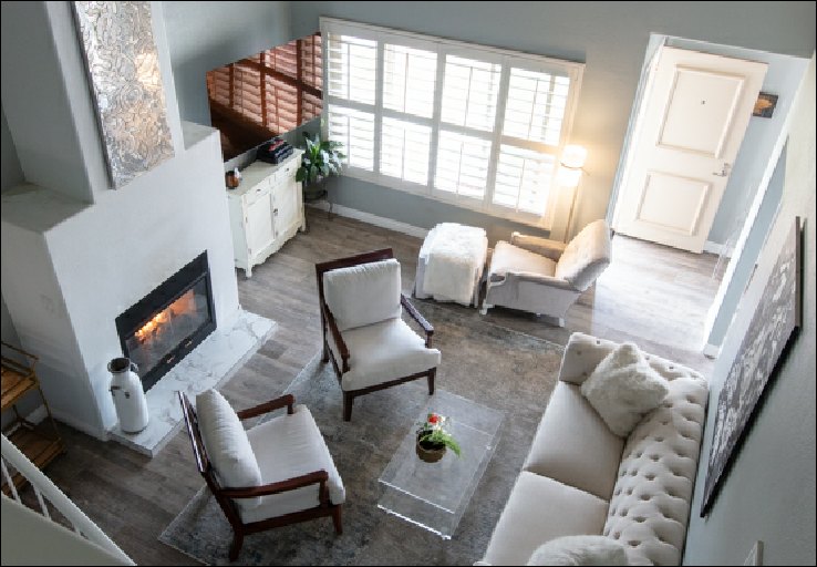Real Estate Photo of interior living room with bright light and big windows (ChrisRyanPIX)